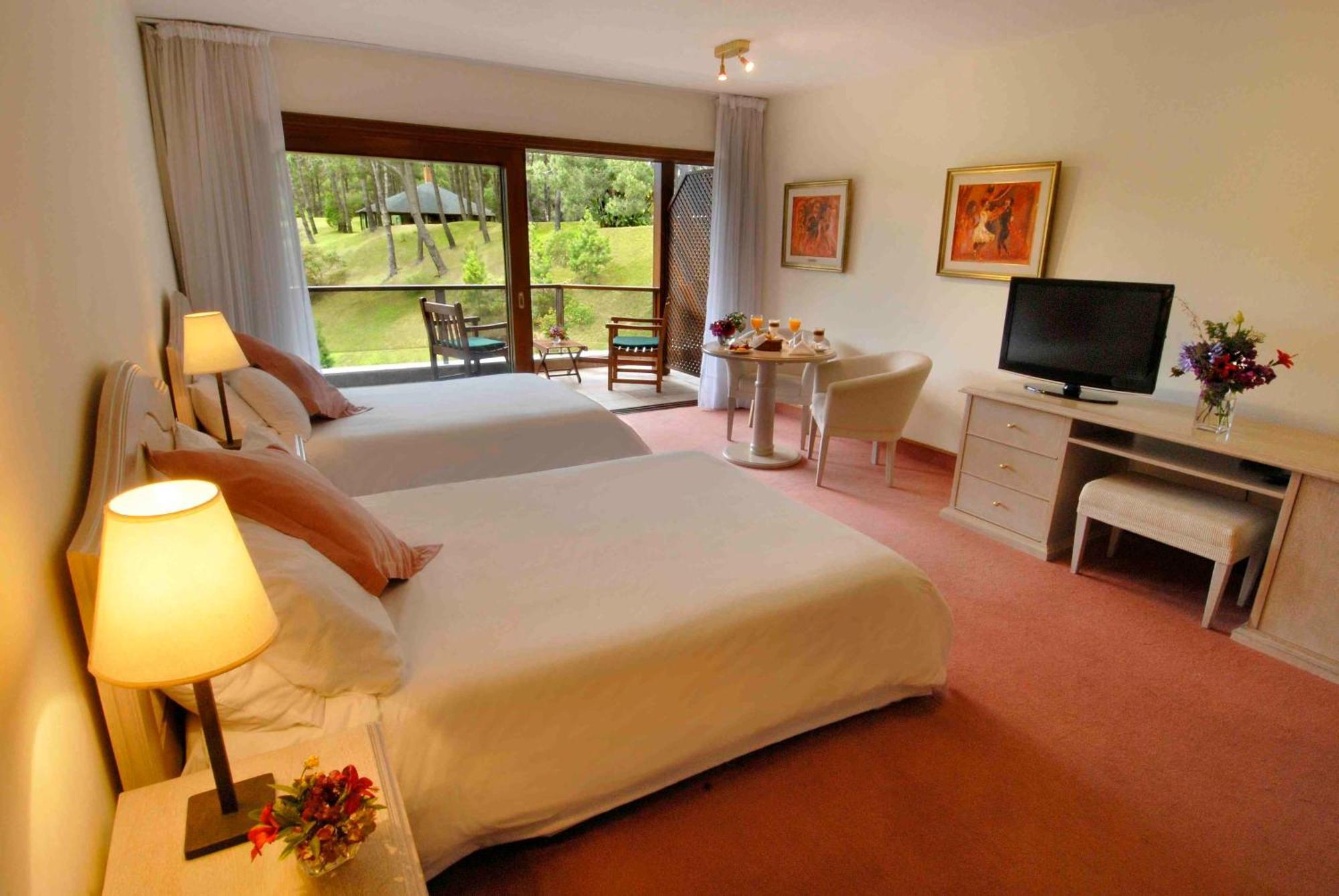 Quarto Duplo com 2 Camas de Casal
